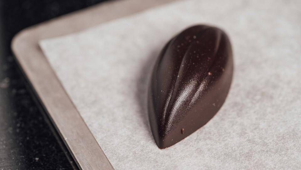 A bonbon showing sugar bloom due to improper storage