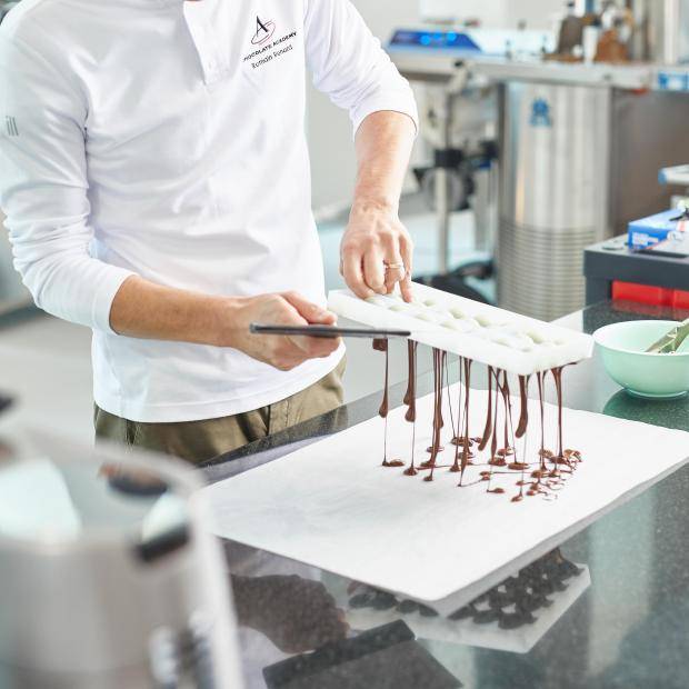 Chocolate bonbons in the making