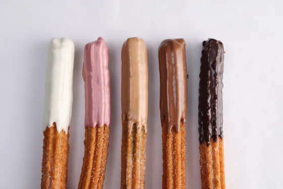 Churros coated with different ganache flavors